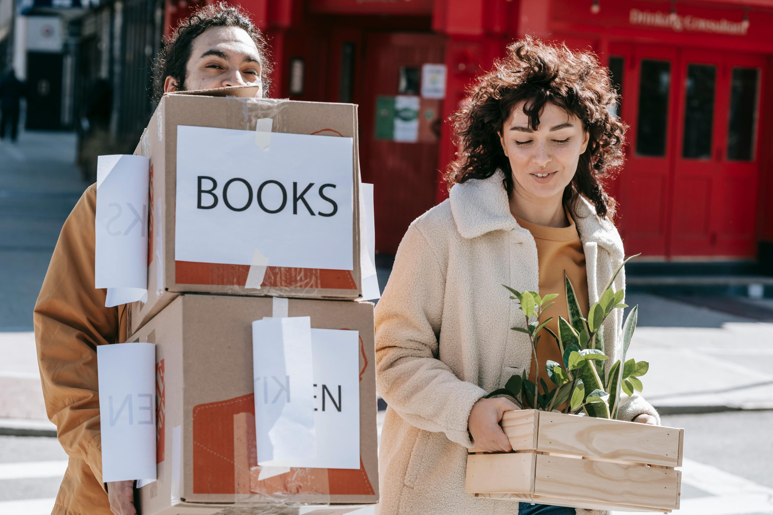 "Neighbors lending a helping hand during a Strategic Move Timing - Fostering community spirit through thoughtful relocation. 