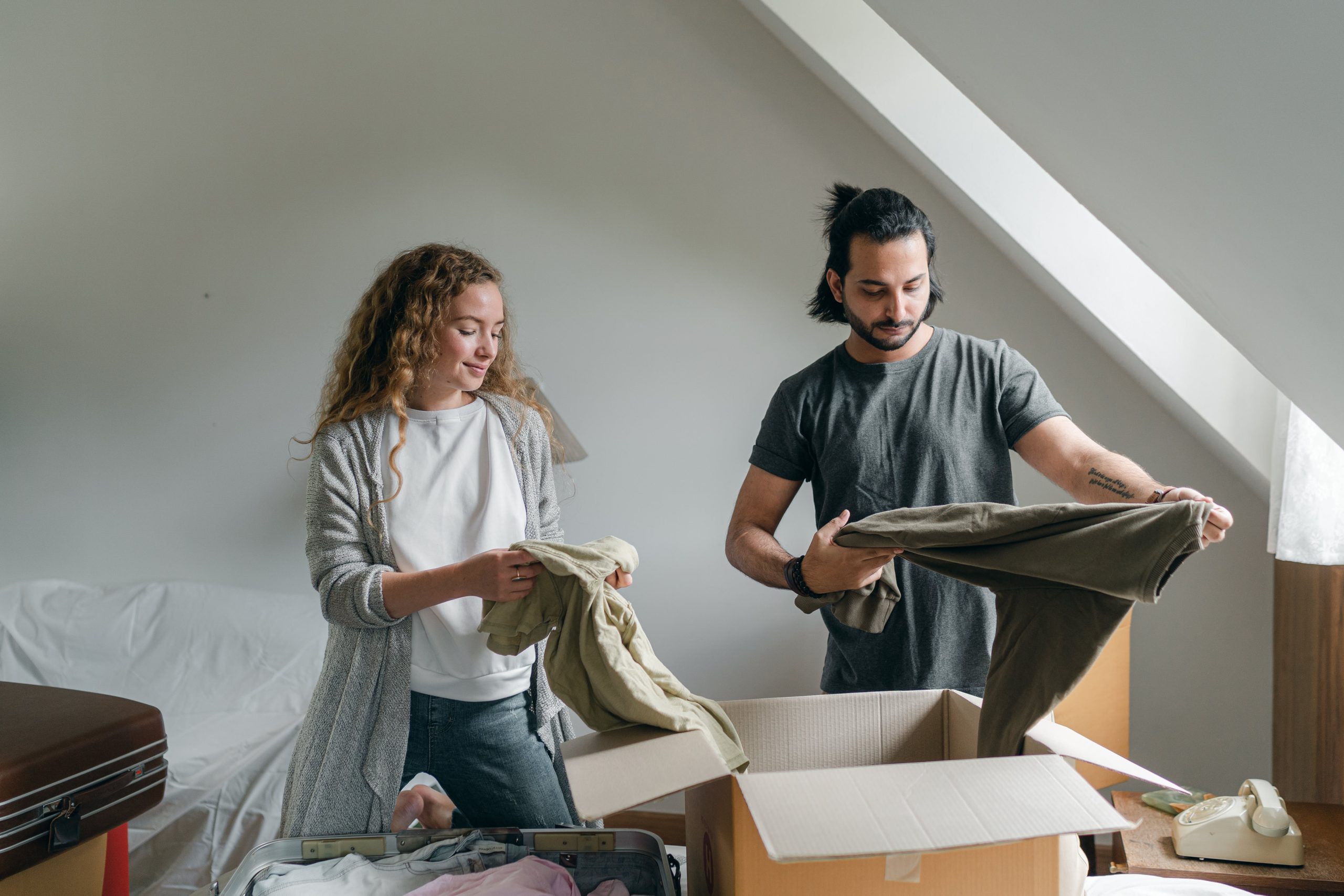  "DIY Independence Pros Packing: A person engaged in DIY packing. Explore the contrasting approaches to empower your move." 