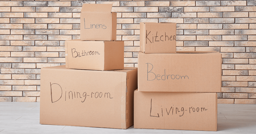 Six packed and labelled boxes are placed. 